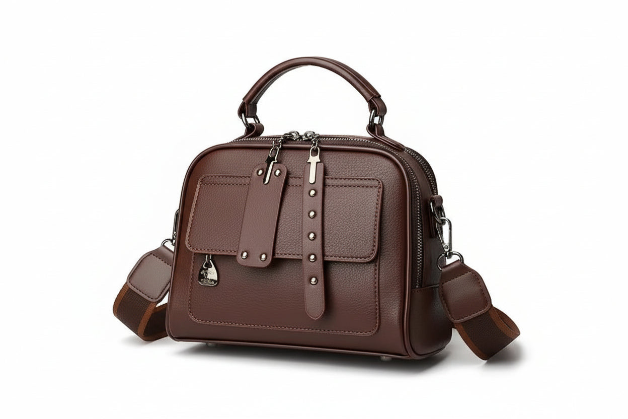 Brown leather handbag with a strap