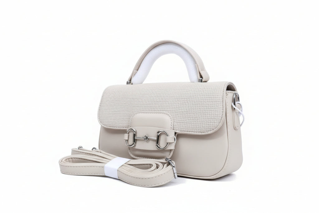 White handbag with matching strap