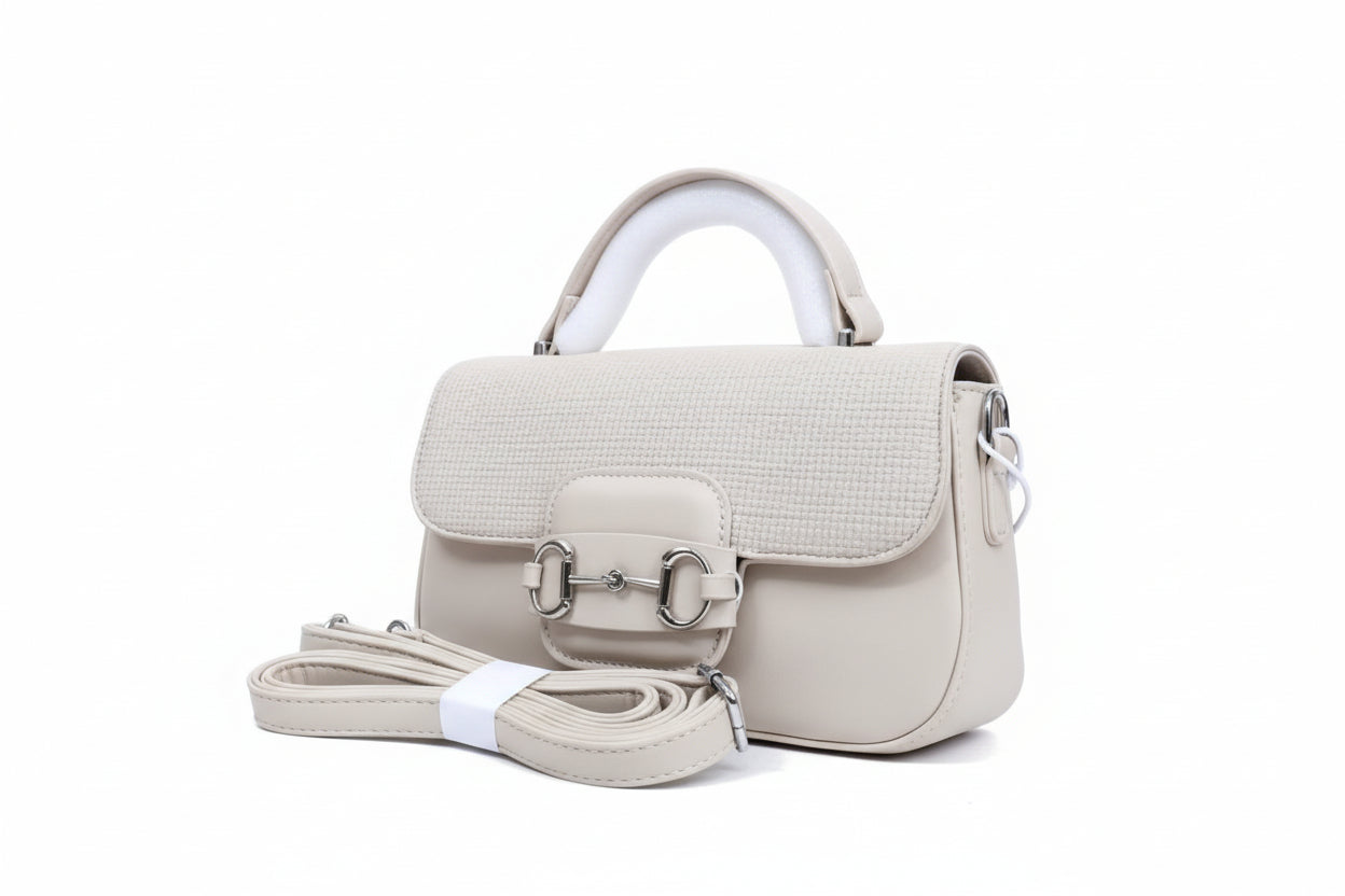 White handbag with matching strap