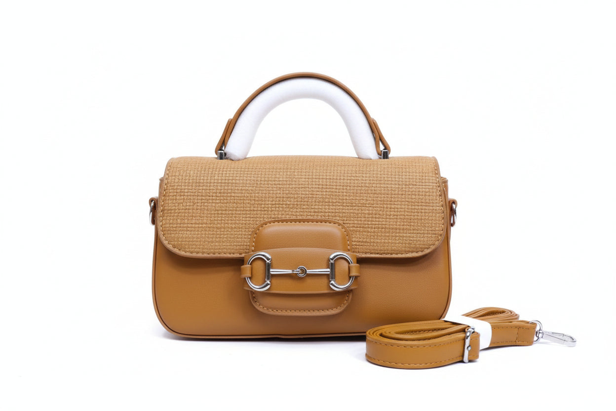 Brown handbag with white handle and horsebit detail, placed in a Burberry box on a light background.